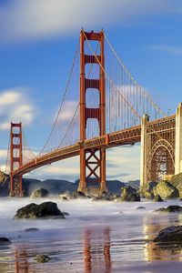 Preview wallpaper bridge, sea, stones, sky