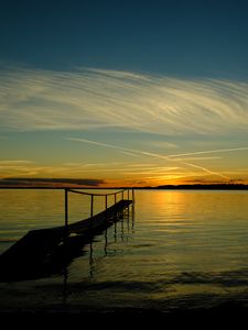 Preview wallpaper bridge, sea, sunset, horizon, river, pier, shore, sky