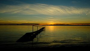 Preview wallpaper bridge, sea, sunset, horizon, river, pier, shore, sky