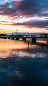 Preview wallpaper bridge, sea, water, reflection, sunset