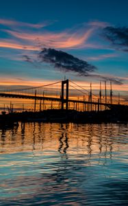Preview wallpaper bridge, silhouette, lake, water, twilight, dark