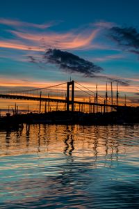 Preview wallpaper bridge, silhouette, lake, water, twilight, dark