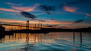 Preview wallpaper bridge, silhouette, lake, water, twilight, dark