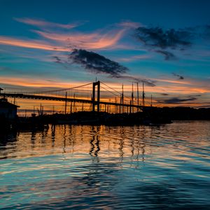 Preview wallpaper bridge, silhouette, lake, water, twilight, dark