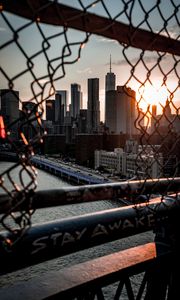 Preview wallpaper bridge, skyscrapers, mesh, fence, sunlight