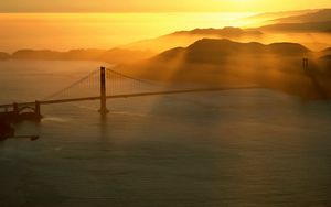 Preview wallpaper bridge, sun, beams, morning, sea