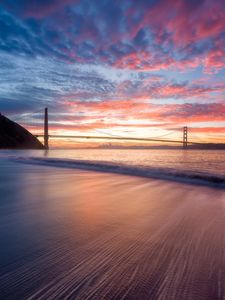 Preview wallpaper bridge, sunset, water, waves
