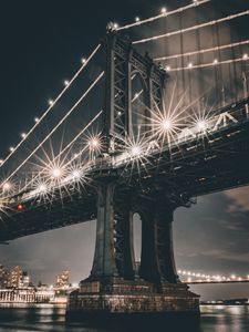 Preview wallpaper bridge, support, lights, river, city, construction, architecture