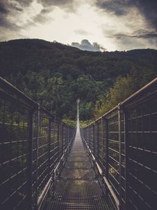 Preview wallpaper bridge, suspension bridge, forest, direction, trees, clouds