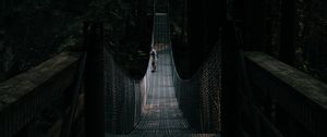 Preview wallpaper bridge, suspension bridge, solitude, forest, dark