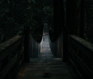 Preview wallpaper bridge, suspension bridge, solitude, forest, dark