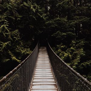 Preview wallpaper bridge, suspension bridge, trees, forest, dark