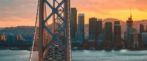 Preview wallpaper bridge, traffic, motion, sunset, city, san francisco, united states