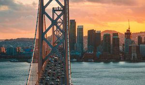 Preview wallpaper bridge, traffic, motion, sunset, city, san francisco, united states