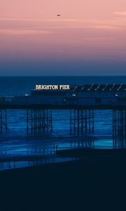 Preview wallpaper brighton, pier, beach, sunset, sea