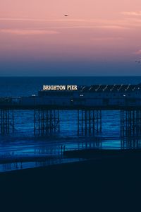 Preview wallpaper brighton, pier, beach, sunset, sea