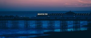 Preview wallpaper brighton, pier, beach, sunset, sea