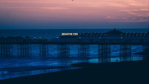 Preview wallpaper brighton, pier, beach, sunset, sea