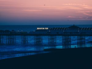 Preview wallpaper brighton, pier, beach, sunset, sea