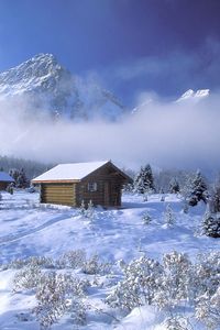 Preview wallpaper british columbia, snow, tracks, small houses, clouds, height, mountains