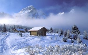 Preview wallpaper british columbia, snow, tracks, small houses, clouds, height, mountains