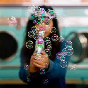 Preview wallpaper bubbles, colorful, iridescent, girl, silhouette