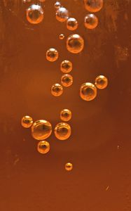 Preview wallpaper bubbles, liquid, orange, transparent