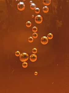 Preview wallpaper bubbles, liquid, orange, transparent