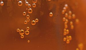 Preview wallpaper bubbles, liquid, orange, transparent