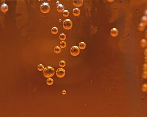 Preview wallpaper bubbles, liquid, orange, transparent