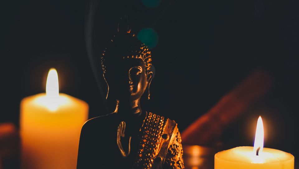 960x544 Wallpaper buddha, figurine, candles, buddhism, harmony