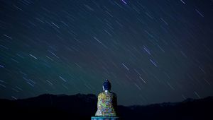 Preview wallpaper buddha, statue, buddhism, starry sky, night