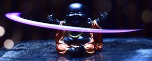 Preview wallpaper buddha, statuette, light, glare, bokeh