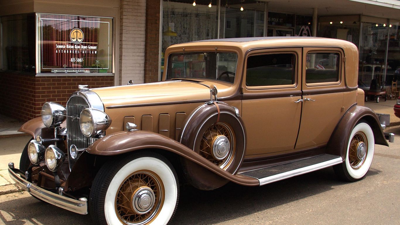 Download wallpaper 1366x768 buick, 1932, brown, vintage, car, whitewall,  street tablet, laptop hd background