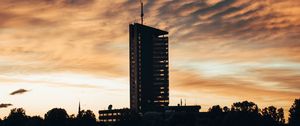 Preview wallpaper building, apartments, silhouette, sunset, river