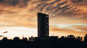 Preview wallpaper building, apartments, silhouette, sunset, river