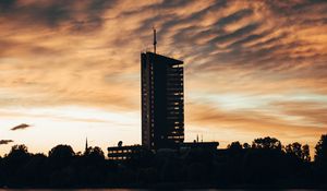 Preview wallpaper building, apartments, silhouette, sunset, river