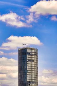 Preview wallpaper building, architecture, airplane, sky