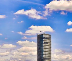 Preview wallpaper building, architecture, airplane, sky