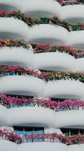Preview wallpaper building, architecture, balconies, white, flowers