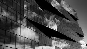 Preview wallpaper building, architecture, facade, windows, glass, clouds, bw