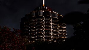 Preview wallpaper building, architecture, facade, bushes, cloudy