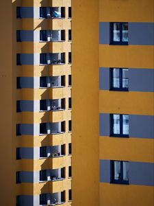 Preview wallpaper building, architecture, facade, windows, yellow