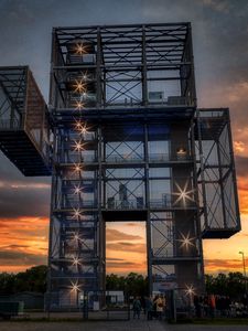 Preview wallpaper building, architecture, lights, sunset