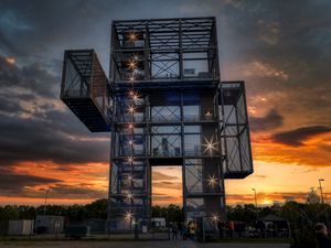 Preview wallpaper building, architecture, lights, sunset