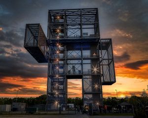 Preview wallpaper building, architecture, lights, sunset