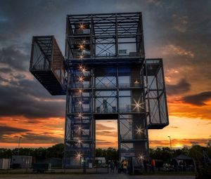 Preview wallpaper building, architecture, lights, sunset