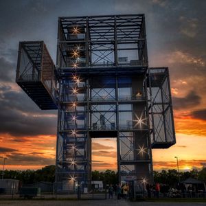 Preview wallpaper building, architecture, lights, sunset