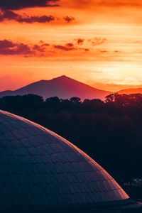 Preview wallpaper building, architecture, roof, sunset, mountains, trees