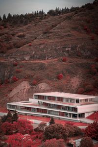 Preview wallpaper building, architecture, trees, mountain, slope